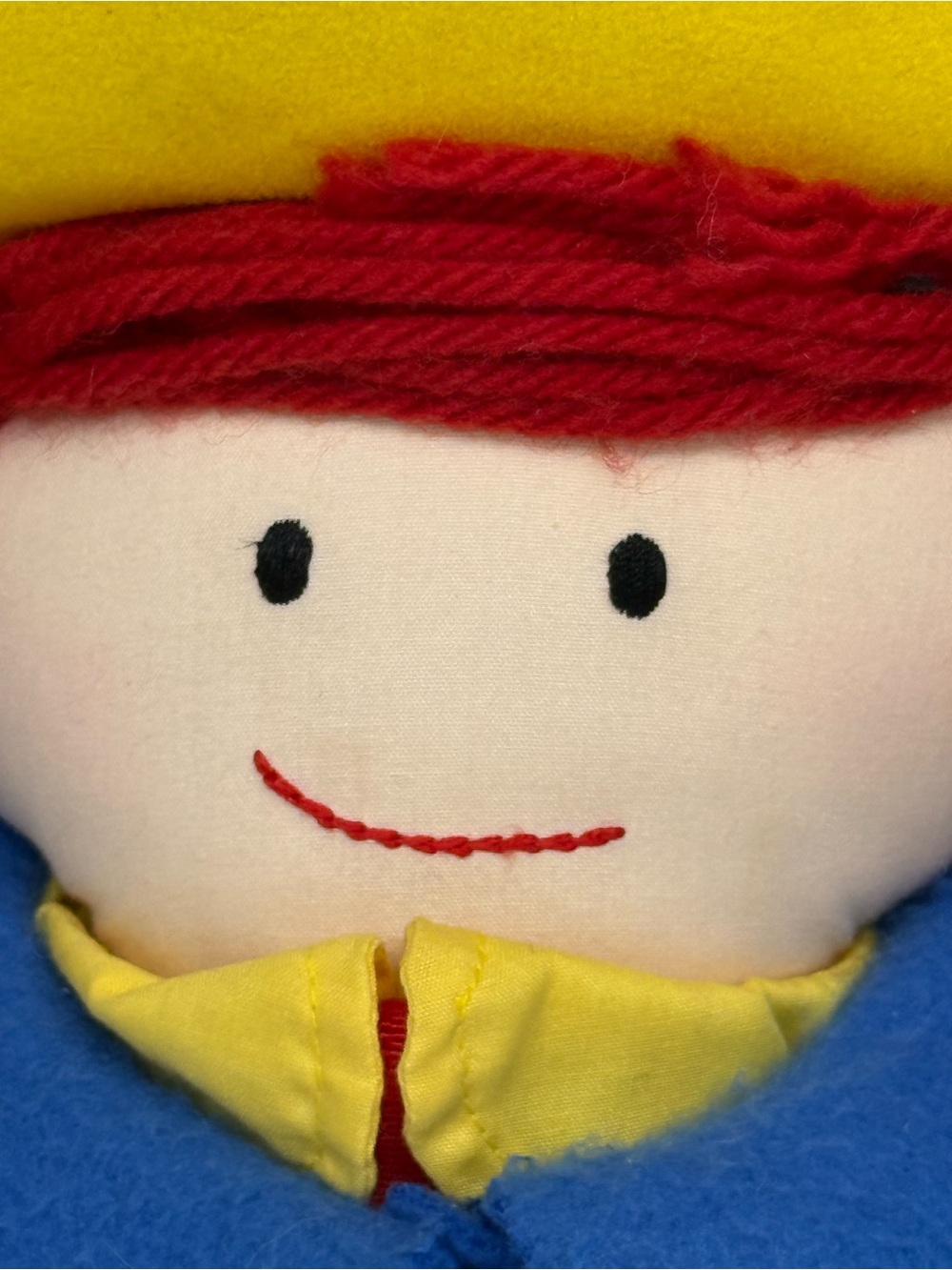Vintage 1994 Eden Madeline plush doll featuring a felt blue coat and yellow hat - Picture 2 of 11